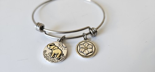 Silver tone expandable wire - tone,