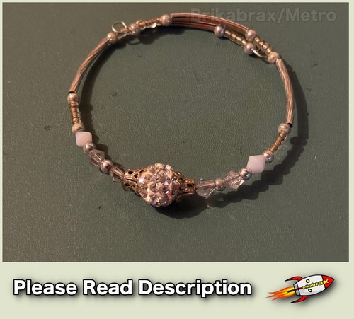 Wire bracelet features central - bracelet,